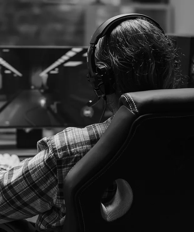 Esports player practising at a desktop gaming setup